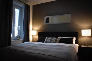 Postel nebo postele na pokoji v ubytování Boutique-Hotel Antica Posta