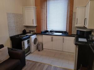 Kuchyň nebo kuchyňský kout v ubytování Rozina Apartment