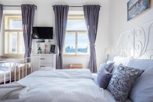 Ліжко або ліжка в номері Charles Apartment