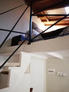 a room with a bunk bed in a loft at Casa Allegri in Florence