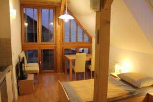 a room with a table and a dining room at Guest accomodation Klancar in Ig