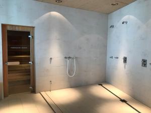 Kúpeľňa v ubytovaní Hotel Ski Austria St.Christoph a.A. + 37 fotografií