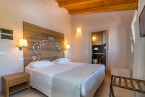 Katil atau katil-katil dalam bilik di Agriturismo Corte Aurea