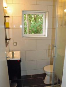 Ένα μπάνιο στο Ferienbungalow in Goehren