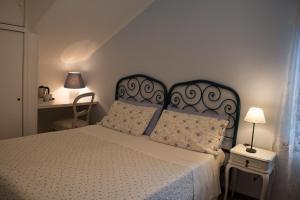 Letto o letti in una camera di Al Rustico