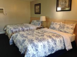 Кровать или кровати в номере Silver Crest Lodge
