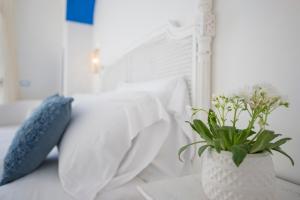 A bed or beds in a room at La Barbera