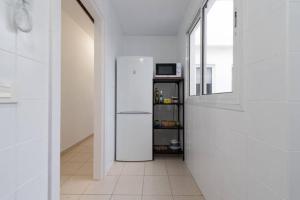 Köök või kööginurk majutusasutuses Stylish apartment in Canteras beach