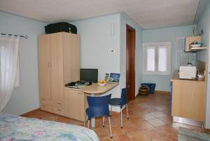 Kuchyň nebo kuchyňský kout v ubytování B&B 21