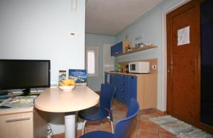 Kuchyň nebo kuchyňský kout v ubytování B&B 21