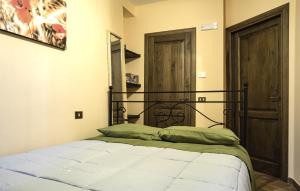 Postel nebo postele na pokoji v ubytování Residenza Frenguelli