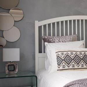 a bedroom with a white bed and a glass table at Sensación Azul in Torrevieja +33 photos