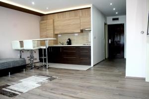 Kuchyňa alebo kuchynka v ubytovaní F&M Apartman