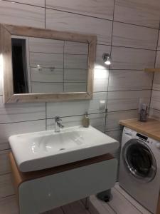 Kúpeľňa v ubytovaní Apartamenty Blisko Plaży Podczele