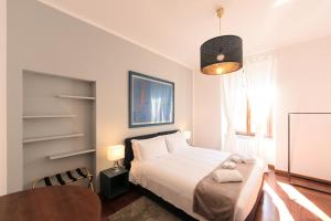 Кровать или кровати в номере Heart Milan Apartments Corso Como