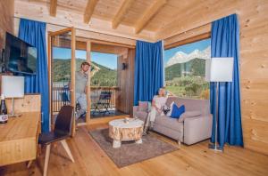 Зона вітальні в Rittis Alpin Chalets Dachstein