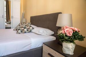 Posteľ alebo postele v izbe v ubytovaní Nunziata Apartment