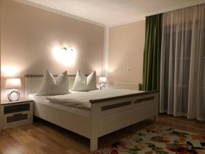 Posteľ alebo postele v izbe v ubytovaní Ferienwohnungen Thalmeier