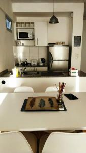 Kuchyňa alebo kuchynka v ubytovaní M & C Suites