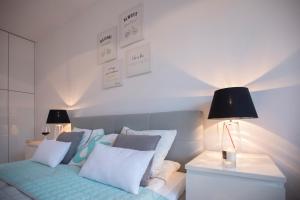 Posteľ alebo postele v izbe v ubytovaní Apartament Sedina Osiedle Polanki