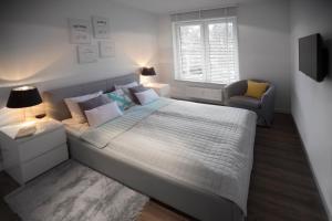Posteľ alebo postele v izbe v ubytovaní Apartament Sedina Osiedle Polanki