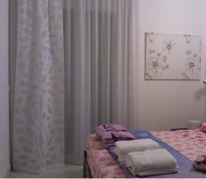 A bed or beds in a room at Kimberly House