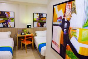 TV in/ali zabaviščno središče v nastanitvi Z Pad Residences