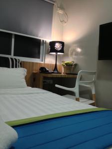 TV in/ali zabaviščno središče v nastanitvi Z Pad Residences