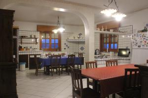 Restoran või mõni muu söögikoht majutusasutuses La casa di Bia
