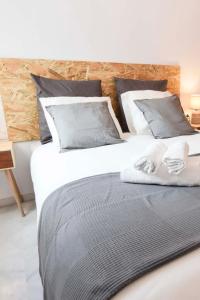 Posteľ alebo postele v izbe v ubytovaní P&P Apartaments Carrera de Capuchinos