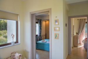 Postel nebo postele na pokoji v ubytování Klisouri Beach Villa