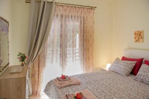 Postel nebo postele na pokoji v ubytování Klisouri Beach Villa