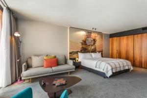 Postel nebo postele na pokoji v ubytování MACq 01 Hotel