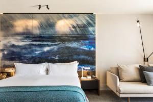 Postel nebo postele na pokoji v ubytování MACq 01 Hotel