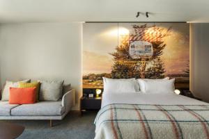 Postel nebo postele na pokoji v ubytování MACq 01 Hotel