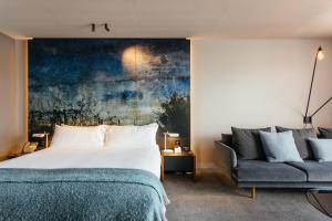 Postel nebo postele na pokoji v ubytování MACq 01 Hotel