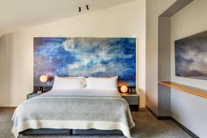 Postel nebo postele na pokoji v ubytování MACq 01 Hotel