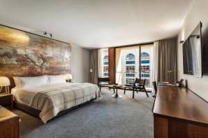 Postel nebo postele na pokoji v ubytování MACq 01 Hotel