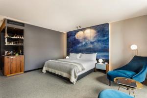Postel nebo postele na pokoji v ubytování MACq 01 Hotel