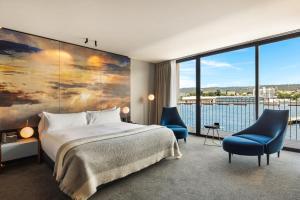 Postel nebo postele na pokoji v ubytování MACq 01 Hotel