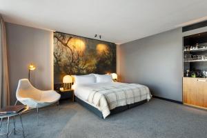 Postel nebo postele na pokoji v ubytování MACq 01 Hotel