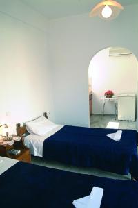 Katil atau katil-katil dalam bilik di Poseidon Studios
