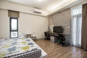 TV a/nebo společenská místnost v ubytování 917 Homestay