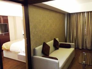 Postel nebo postele na pokoji v ubytování Hotel Oxina Lygon