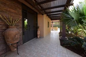 埃拉特Flintstone Guest House בית ההארחה בן 11 החדרים אינו וילה פרטית אתם מזמינים רק חדרים לא את כל הוילה的相册照片