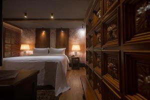 Postel nebo postele na pokoji v ubytování HANI I PAZARIT Boutique Hotel