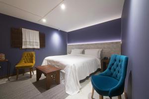 Postel nebo postele na pokoji v ubytování HANI I PAZARIT Boutique Hotel