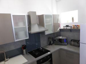 Dapur atau dapur kecil di Appartement Bayeux