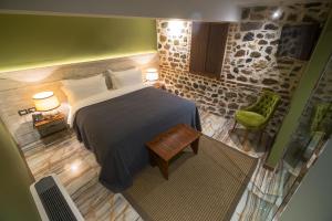 Postel nebo postele na pokoji v ubytování HANI I PAZARIT Boutique Hotel