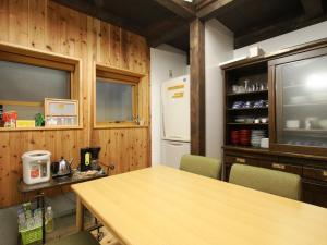 Kuchyň nebo kuchyňský kout v ubytování Iwamura Guest House Yanagiya